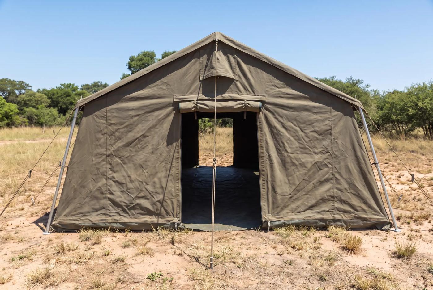 Olive army frame tent