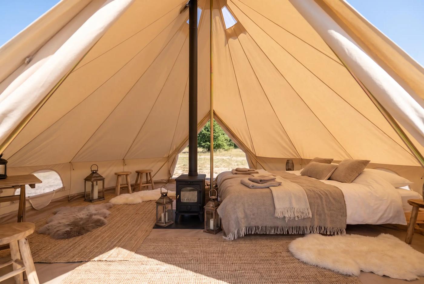 Bell tent interior with stove